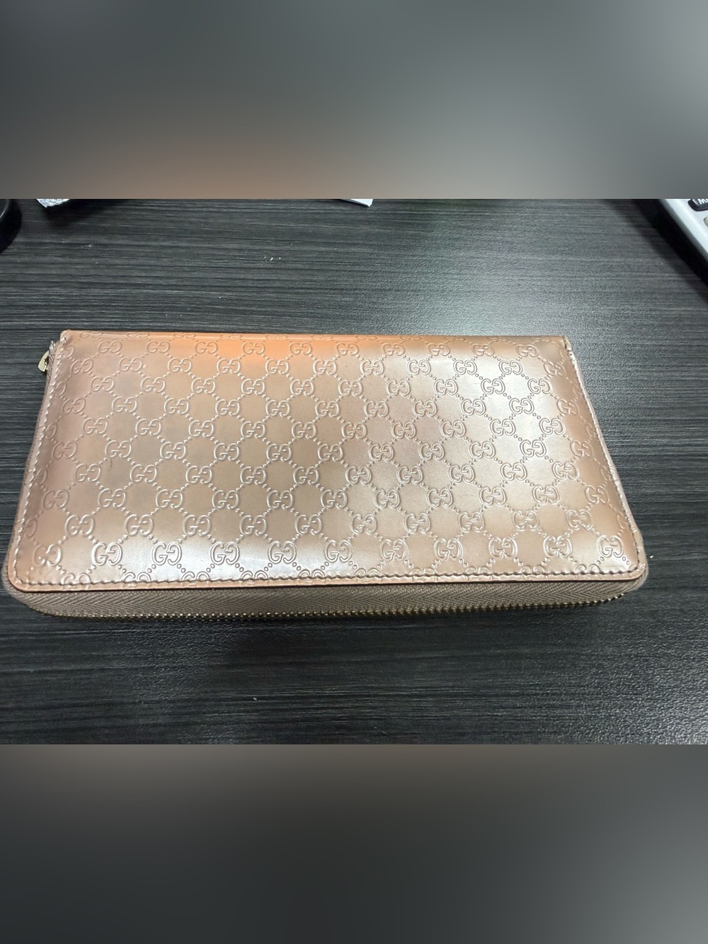 Gucci Metallic Rose Gold GG Embossed Zip Wallet with certificate of authenticity
